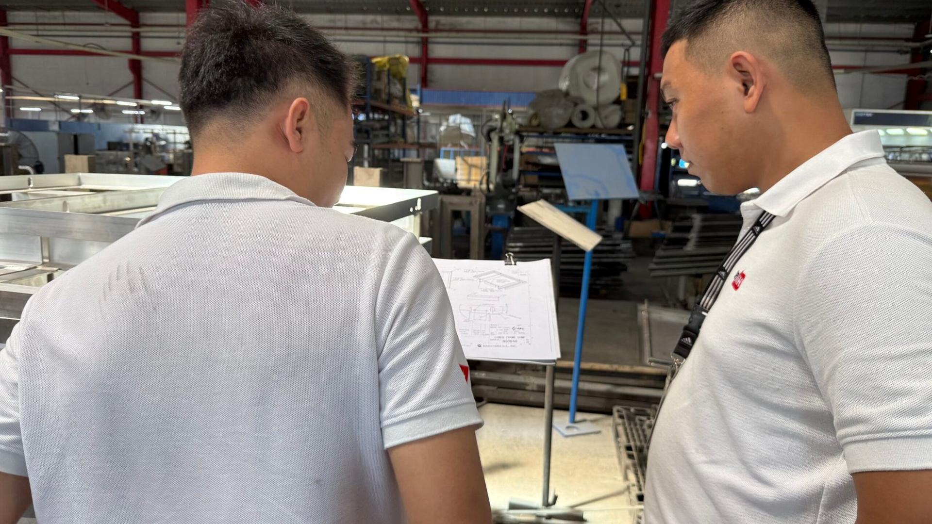 DEWIN engineer performing an on-site inspection at a partner factory in Vietnam