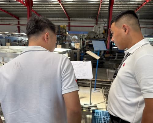 Dewin team performing on-site inspection at a Vietnam factory
