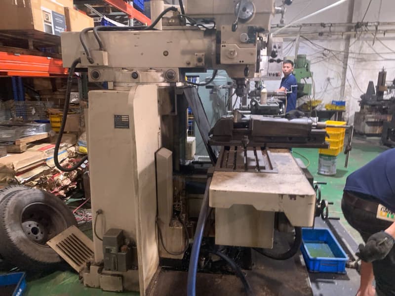 CNC milling machine cutting a part at Alugos, a DEWIN-verified Vietnamese supplier facility