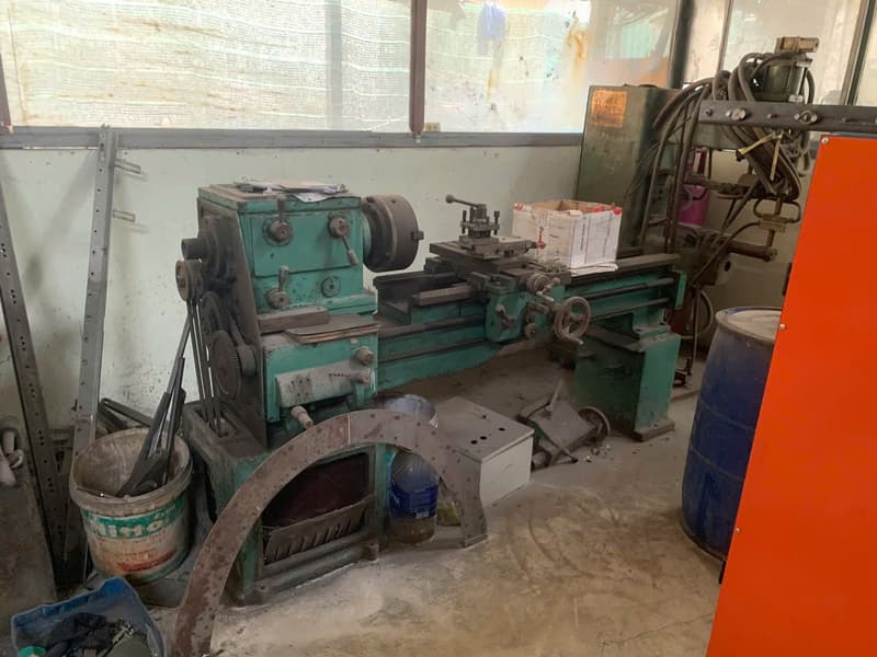 CNC lathe in production at Global Mechanical Construction Production, a DEWIN-verified Vietnamese supplier facility
