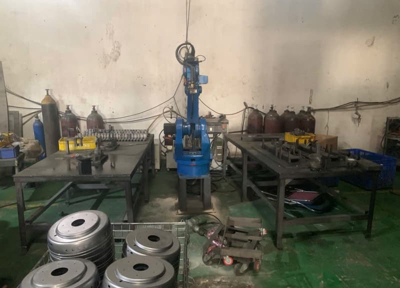 Automatic welding machine at Alugos Company, an audited DEWIN partner factory in Vietnam