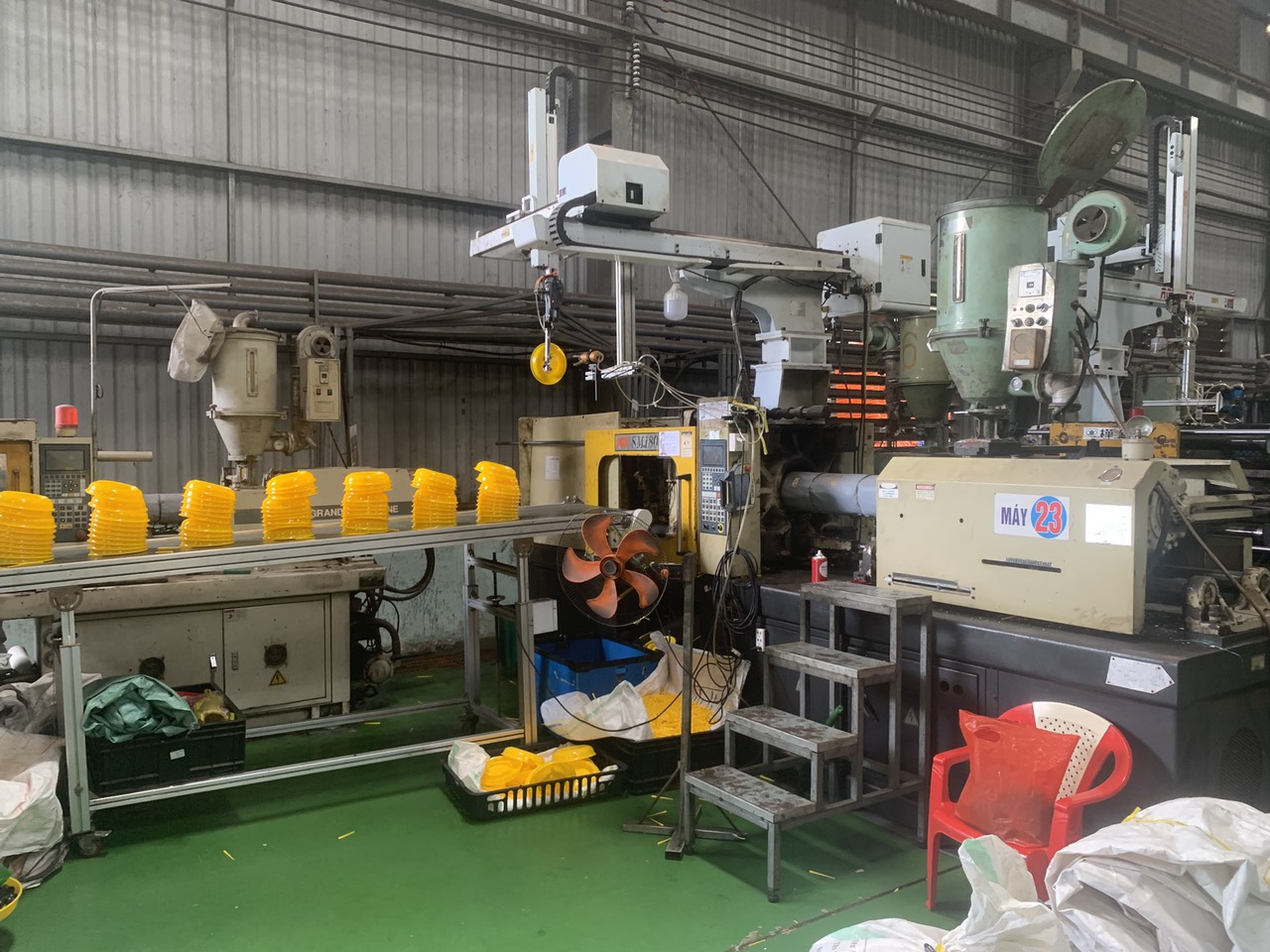 Modern injection molding machine at Vietnam manufacturing facility