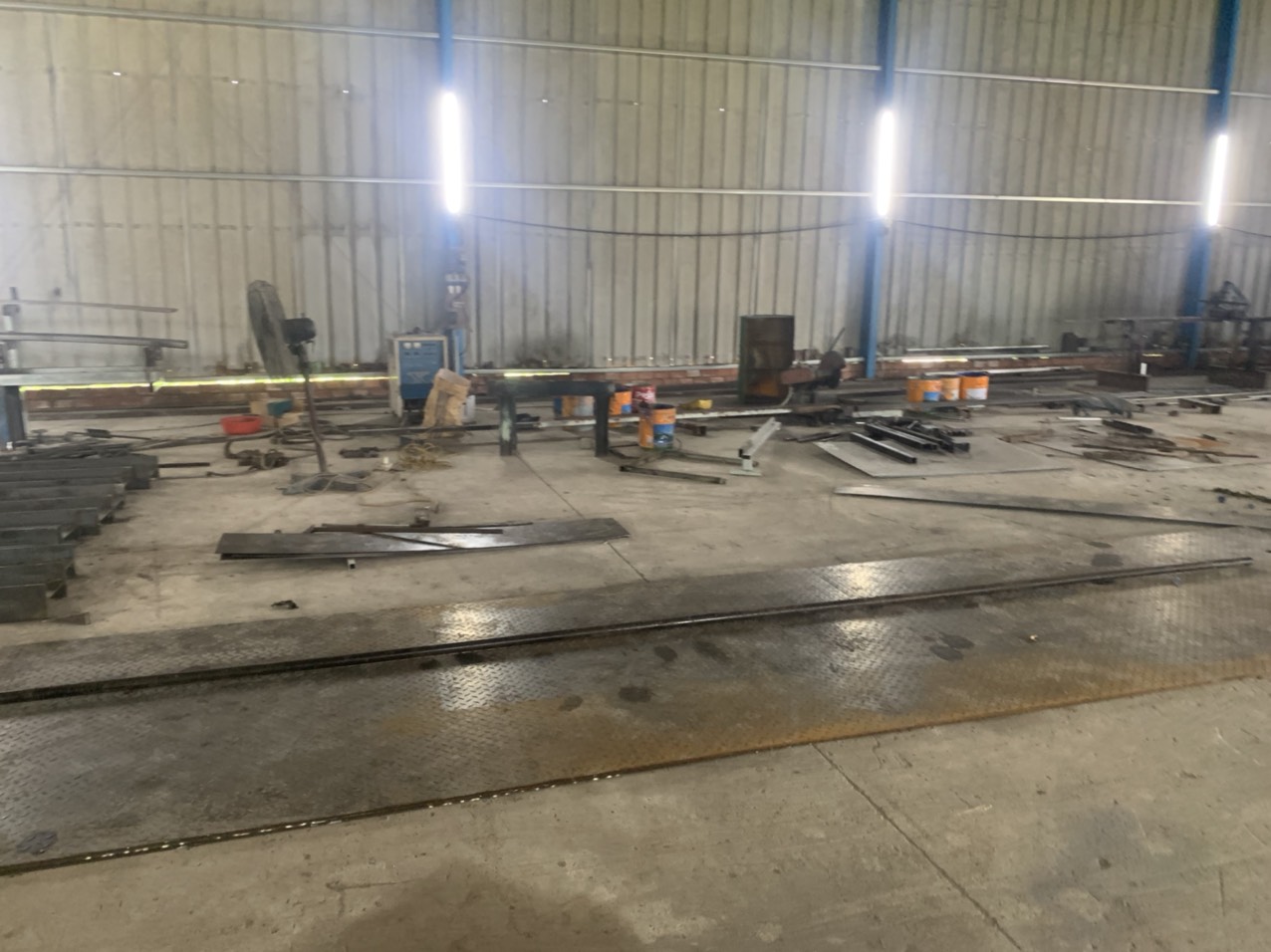 Vietnam welding workshop with multiple welding stations and finished steel assemblies