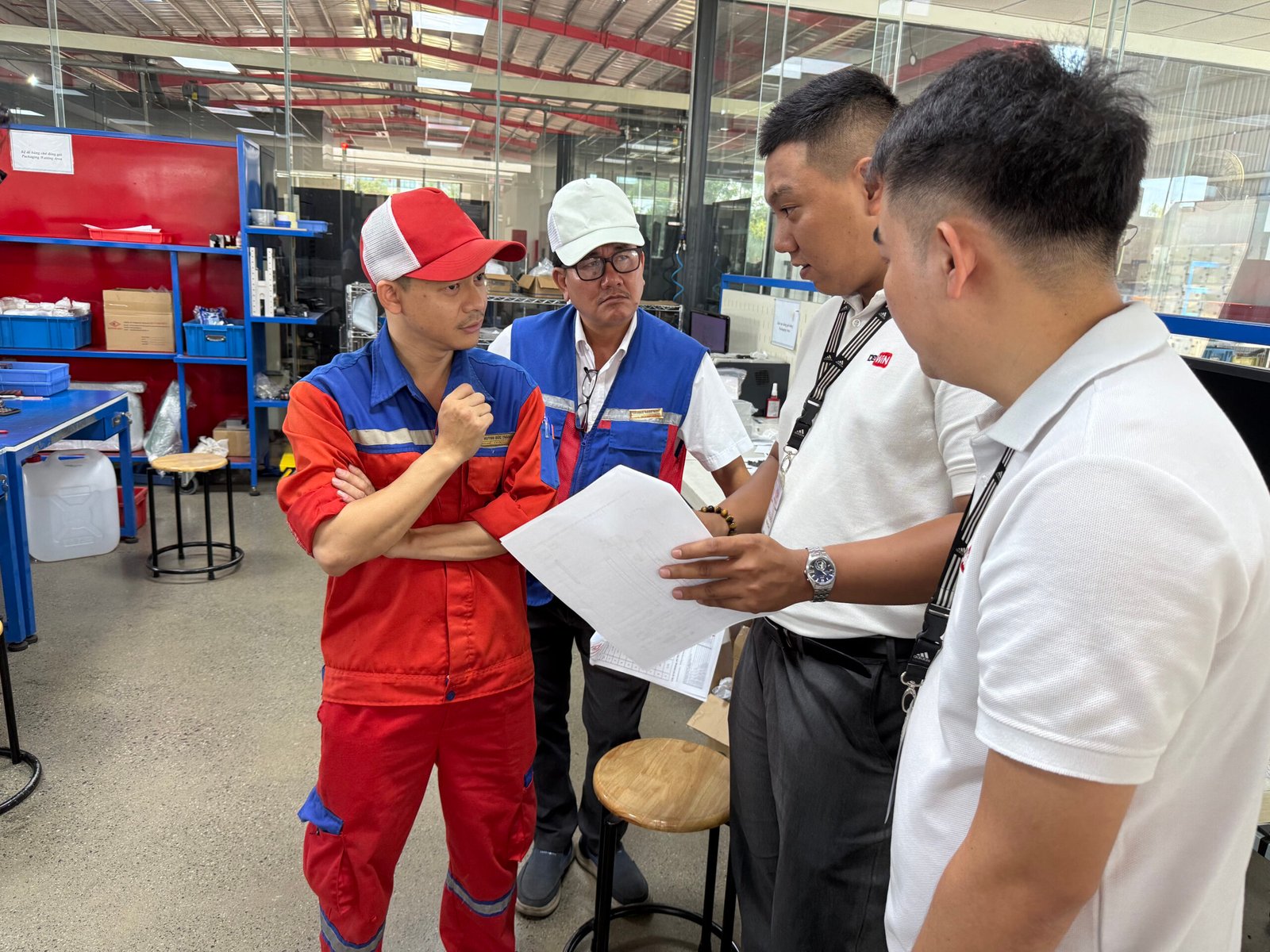 Production follow-up discussion with factory staff